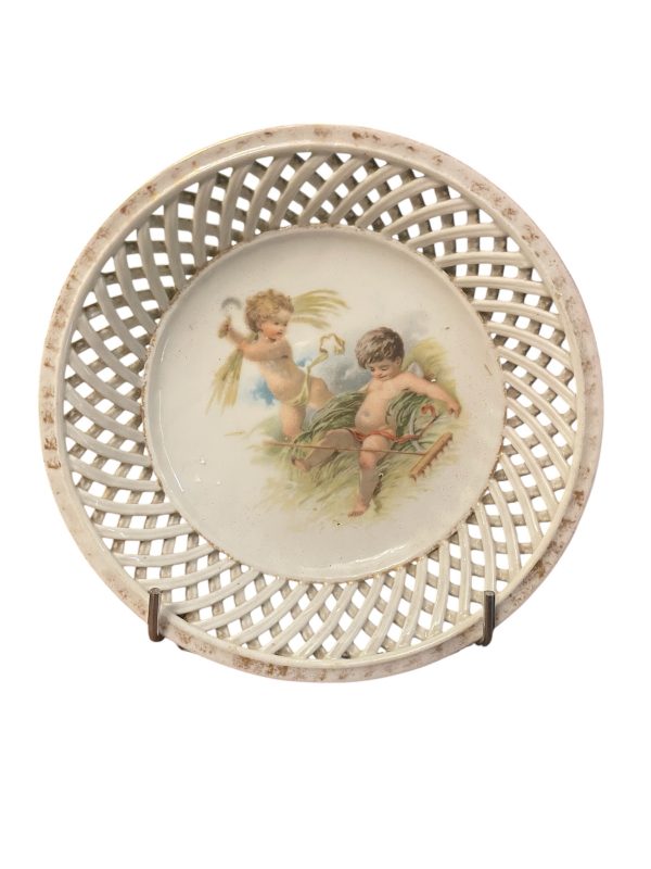 Coupelle en porcelaine de Limoges blanche ajourée avec décors de chérubins-Ciotola in porcellana bianca di Limoges con decorazioni traforate di cherubini